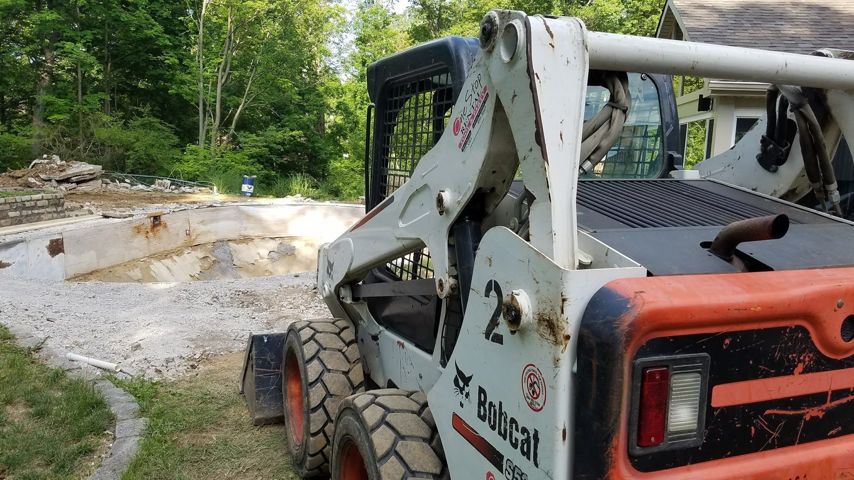 cincinnati pool excavator using a bobcat